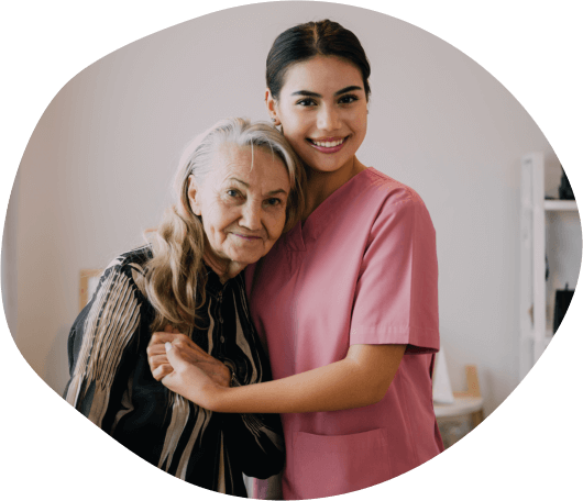 nurse hugging elder