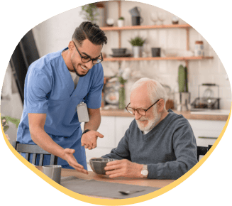 nurse feeding senior